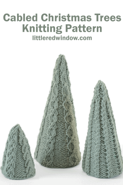 Three cabled Christmas Trees, knitted in soft green yarn and featuring delicate cable patterns, are displayed in small, medium, and large sizes. Text above reads, "Cabled Christmas Trees Knitting Pattern littleredwindow.com".
