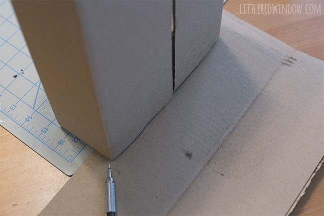 How to make a DIY Doll Crib from an old cardboard box!