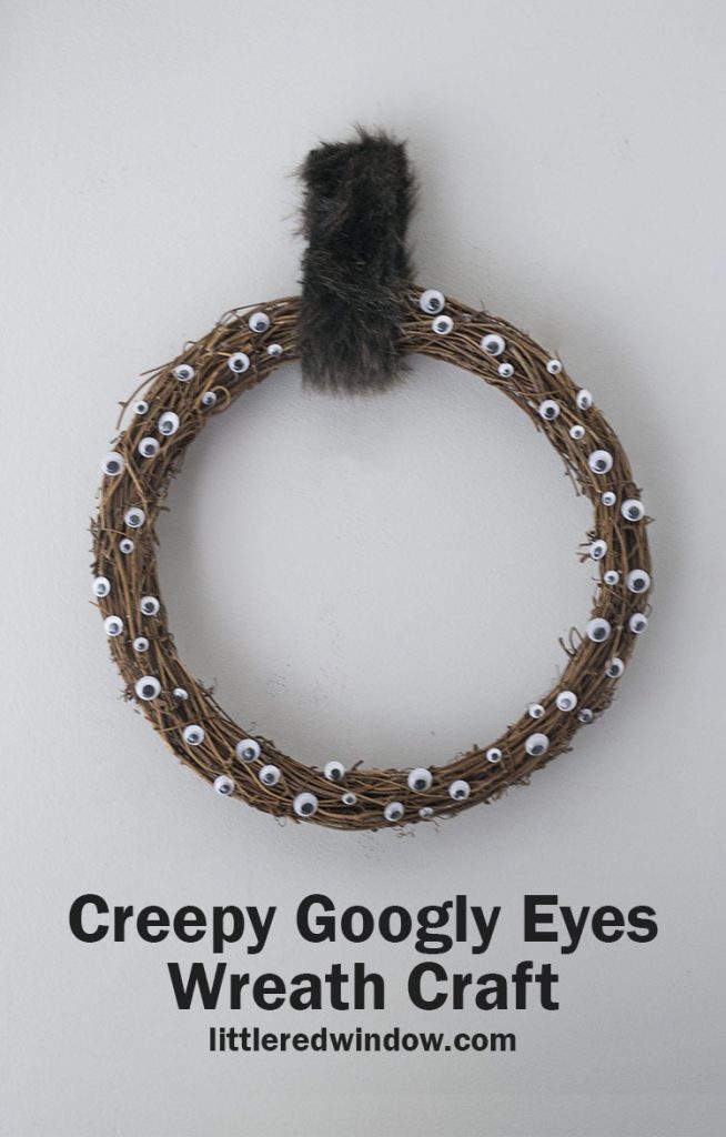 This quick and easy creepy google eyes wreath craft is the perfect Halloween craft to make for your home! Kids can help too!
