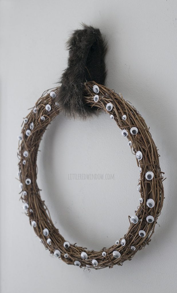 side view of creepy googly eyes wreath