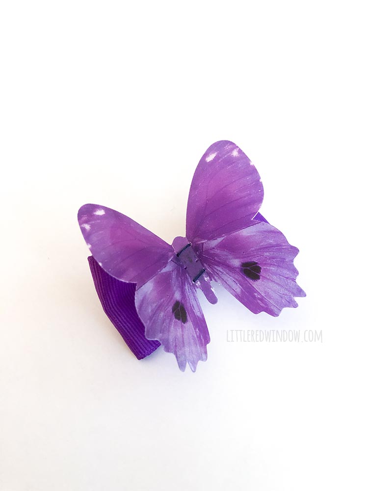 It's easy to make a butterfly hair bow, just sew a cute plastic butterfly to a hair clip!