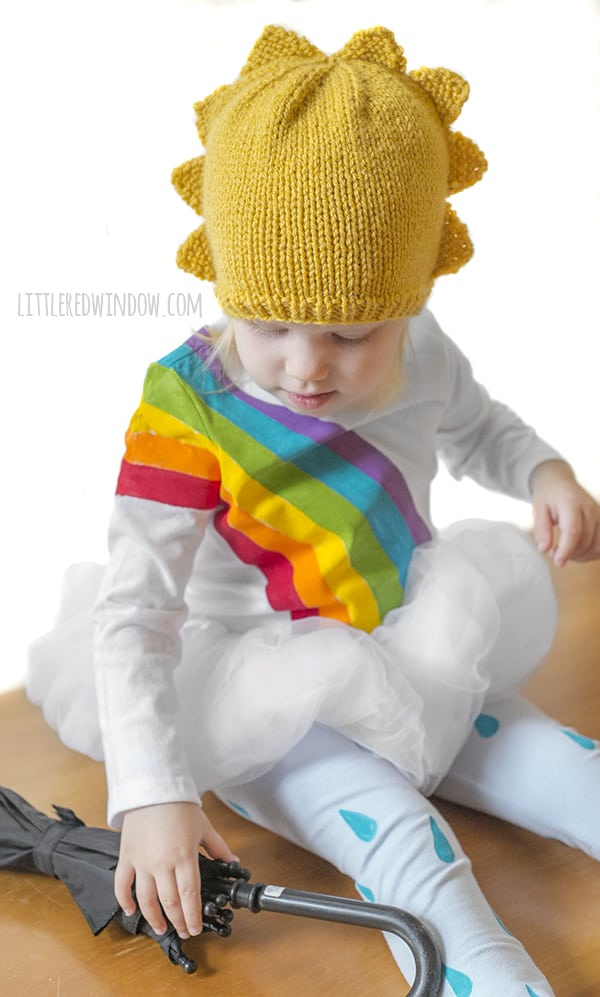 DIY Rainbow Costume for Kids! Get instructions to make this adorable costume including rainbow shirt, cloud tutu, raindrop leggins and sun hair clip!