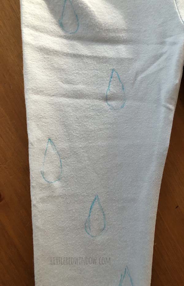 DIY Rainbow Costume for Kids! Get instructions to make this adorable costume including rainbow shirt, cloud tutu, raindrop leggins and sun hair clip!