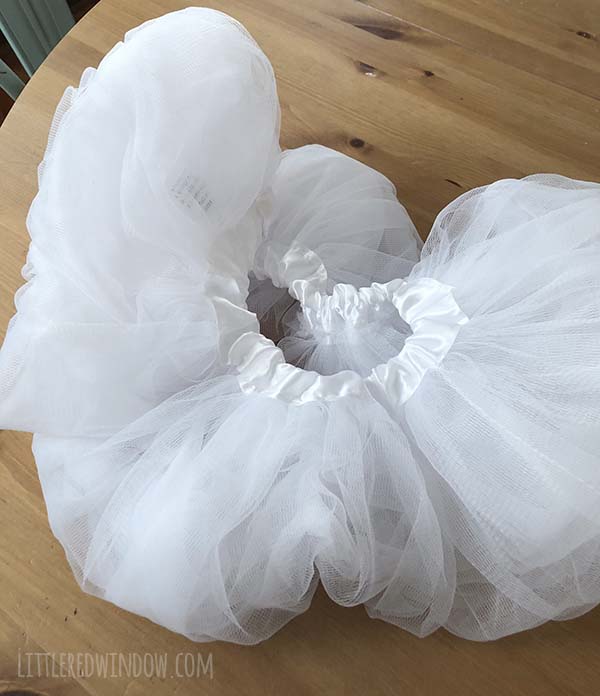 DIY Rainbow Costume for Kids! Get instructions to make this adorable costume including rainbow shirt, cloud tutu, raindrop leggins and sun hair clip!