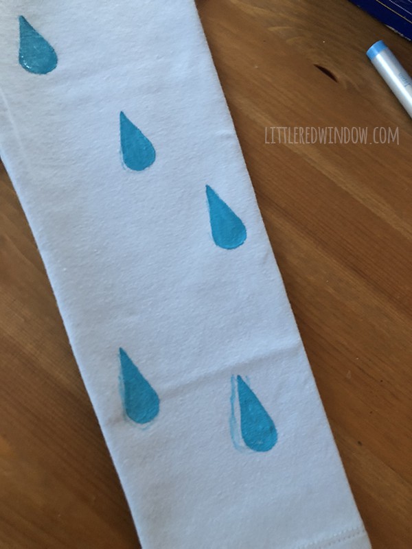 DIY Rainbow Costume for Kids! Get instructions to make this adorable costume including rainbow shirt, cloud tutu, raindrop leggins and sun hair clip!