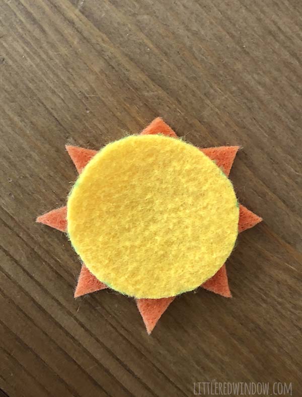 DIY Rainbow Costume for Kids! Get instructions to make this adorable costume including rainbow shirt, cloud tutu, raindrop leggins and sun hair clip!