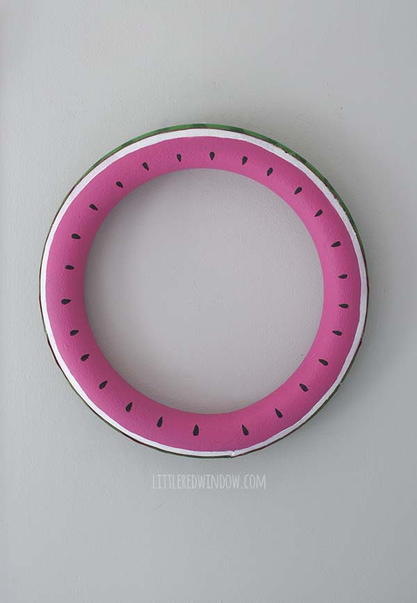 Cute DIY Summer Watermelon Wreath craft, whip up this fun colorful wreath for your front door this summer! | littleredwindow.com