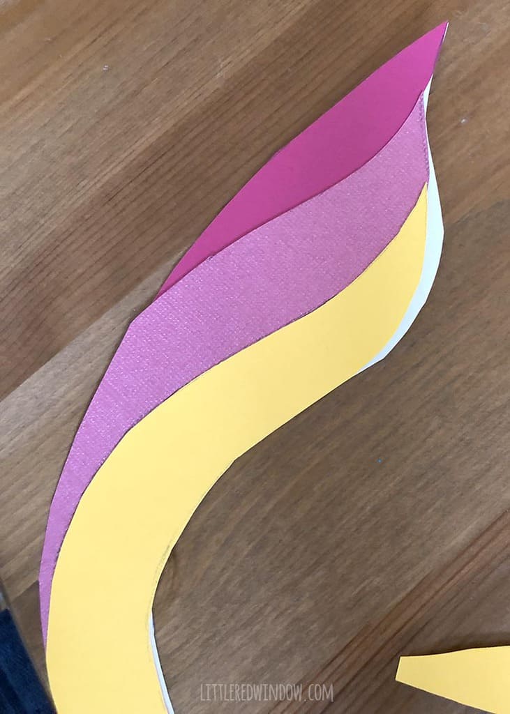 Use colored cardstock to make the rainbow hair for your DIY unicorn mirror