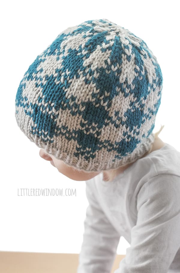 Easy Plaid Hat Knitting Pattern for newborns, babies and toddlers, this is a fun quick knit with and easy plaid pattern that only uses two colors of yarn! | littleredwindow.com