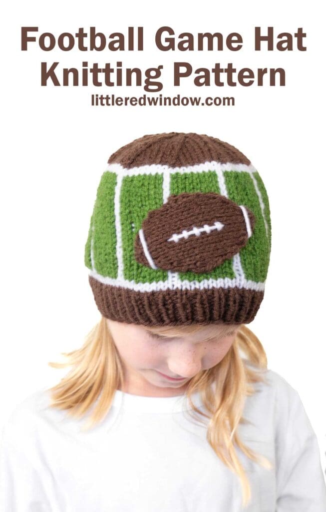 A child wearing a football hat—a knitted hat designed to resemble a football field with a football on top. Text above reads: "Football Game Hat Knitting Pattern littleredwindow.com".