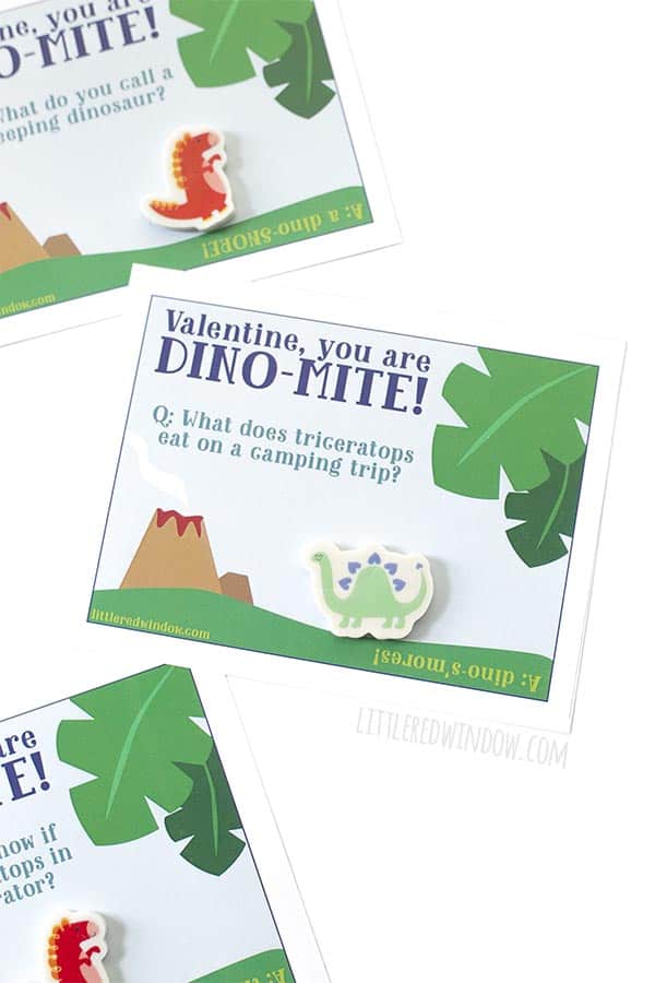 Closeup of free printable dinosaur valentines with cute green dinosaur eraser!