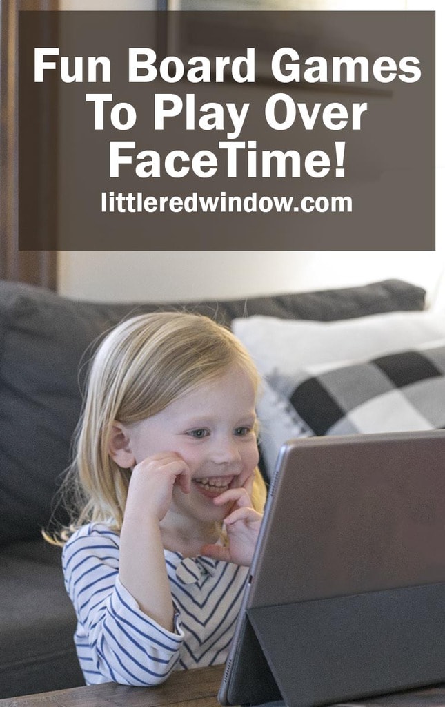 Smiling girl talking to someone on a video screen