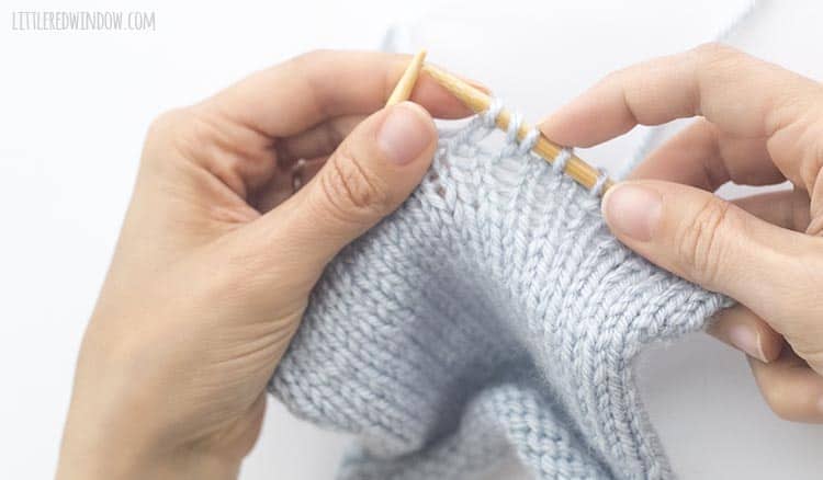 When you do a yarn over, you will add a hole between two knit stitches in your knitting project.