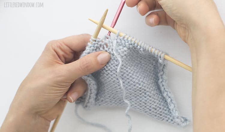 Learn how to fix a dropped purl stitch in your knitting project!