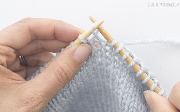 To ktbl, insert the right needle through the BACK of the stitch from right to left