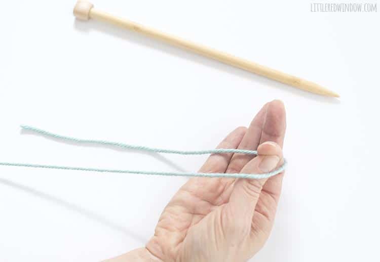 To make a slip not, put your two fingers between the folded over end of the yarn