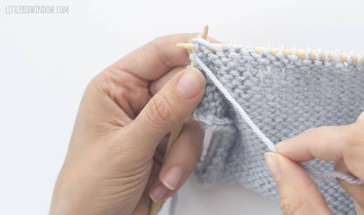 To p2tog, wrap the yarn around the tip of the right knitting needle