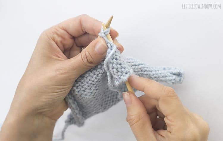 Insert the right needle through the back of the first two stitches on the left needle from left to right