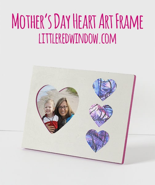 frame with heart shapes cut from child's artwork applied to the frame