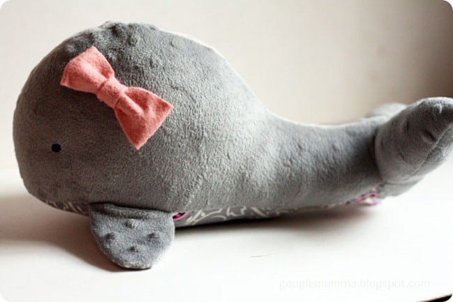 gray minky whale stuffed animal with pink bow