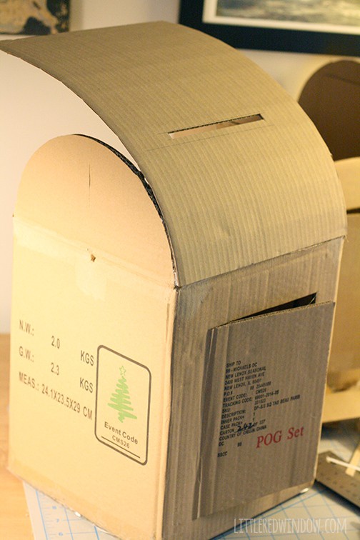 Mailbox with curved top being glued on