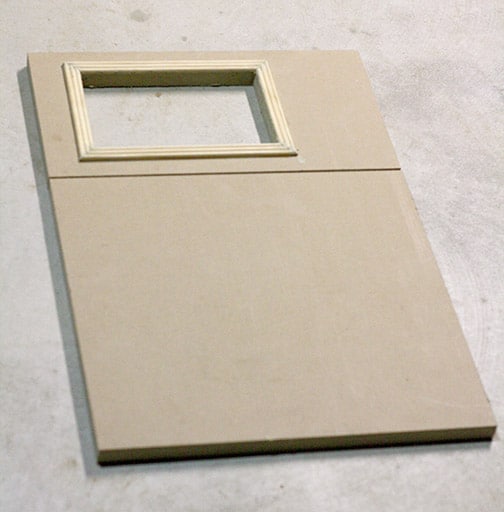 Unfinished wood doors for the nightstand, bottom door is plain, top door has a window cut out to look like a microwave door