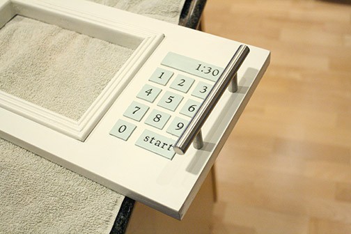 Microwave door with stainless steel bar handle attached