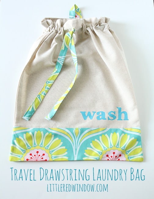 Travel Drawstring Laundry Bag Tutorial | littleredwindow.com | Make an pretty and useful travel laundry bag with cute stenciled detail with this great tutorial!