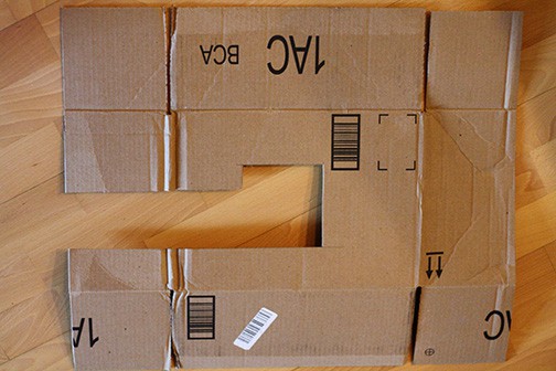 DIY Cardboard Box Play Sewing Machine | littleredwindow.com | Great tutorial for an adorable play sewing machine made out of an old box!