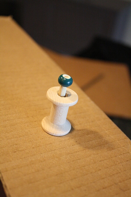 DIY Cardboard Box Play Sewing Machine | littleredwindow.com | Great tutorial for an adorable play sewing machine made out of an old box!