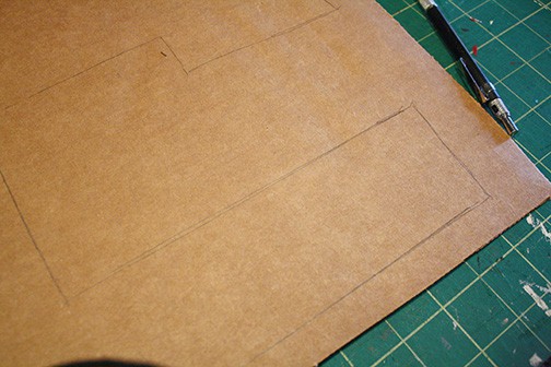 DIY Cardboard Box Play Sewing Machine | littleredwindow.com | Great tutorial for an adorable play sewing machine made out of an old box!