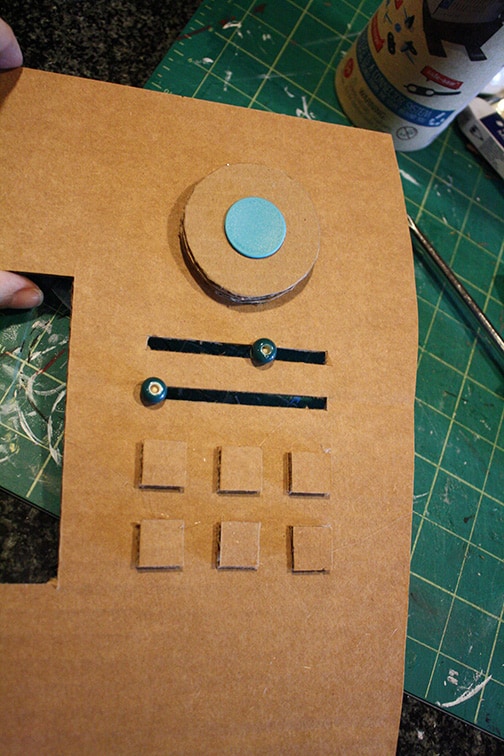 DIY Cardboard Box Play Sewing Machine | littleredwindow.com | Great tutorial for an adorable play sewing machine made out of an old box!