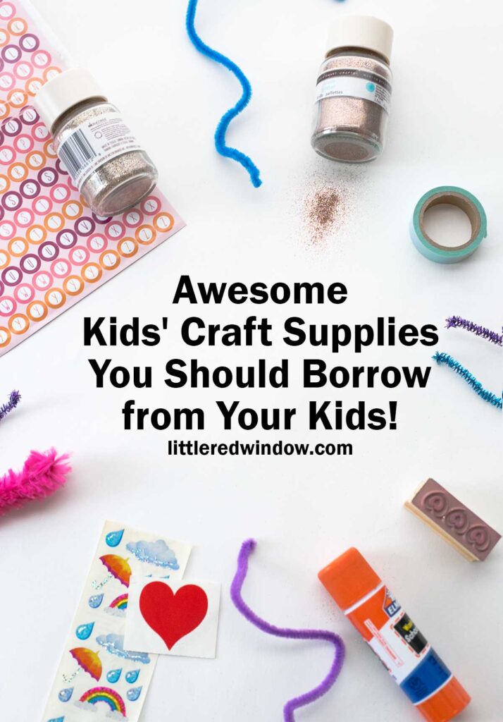 kids craft supplies including glue stick chenille stems glitter and stickers arranged in a circle on a white background