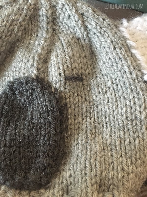 closeup of how to embroider the koala eye on the front of the koala hat
