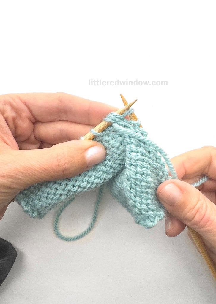 Pull the yarn through all 3 stitches together.