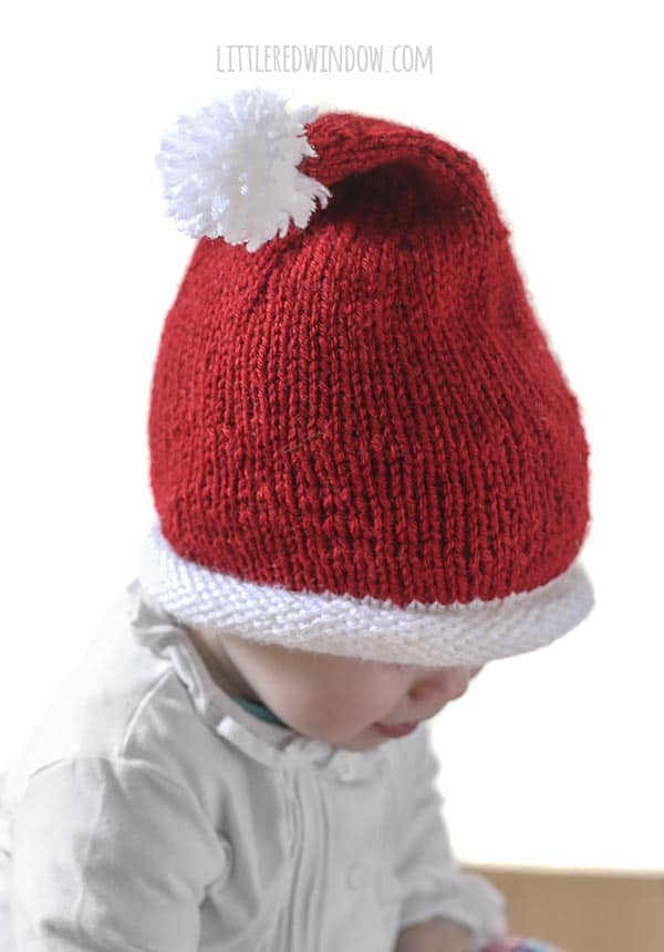 Little Santa Hat Knitting Pattern, a simple pattern for your little one for the holidays! | littleredwindow.com