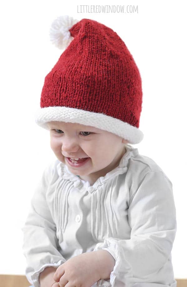 Little Santa Hat Knitting Pattern, a simple pattern for your little one for the holidays! | littleredwindow.com