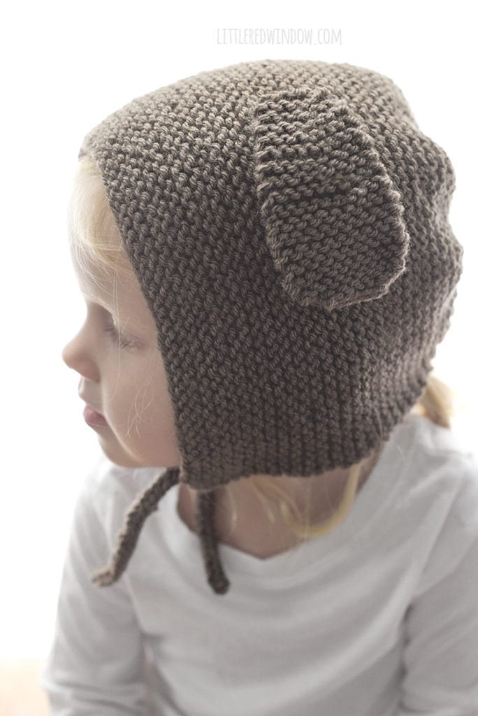The puppy dog bonnet knitting pattern has instructions for adding function chin ties to keep the bonnet on your little one!