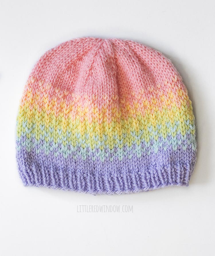 dotted fade hat overhead view from rainbow fades hats knitting pattern on white background