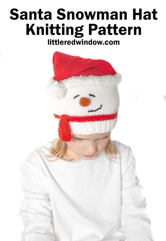 A child dons a knitted hat styled as a snowman, complete with a red Santa hat and scarf. Above them, the text reads