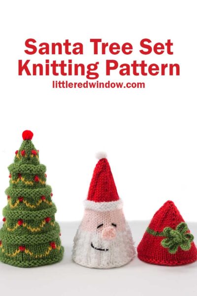 Three cone shaped knit Christmas trees that look like a classic green tree, a Santa head and a Christmas present with a bow in front of a white background lined up from largest on the left to smallest on the right