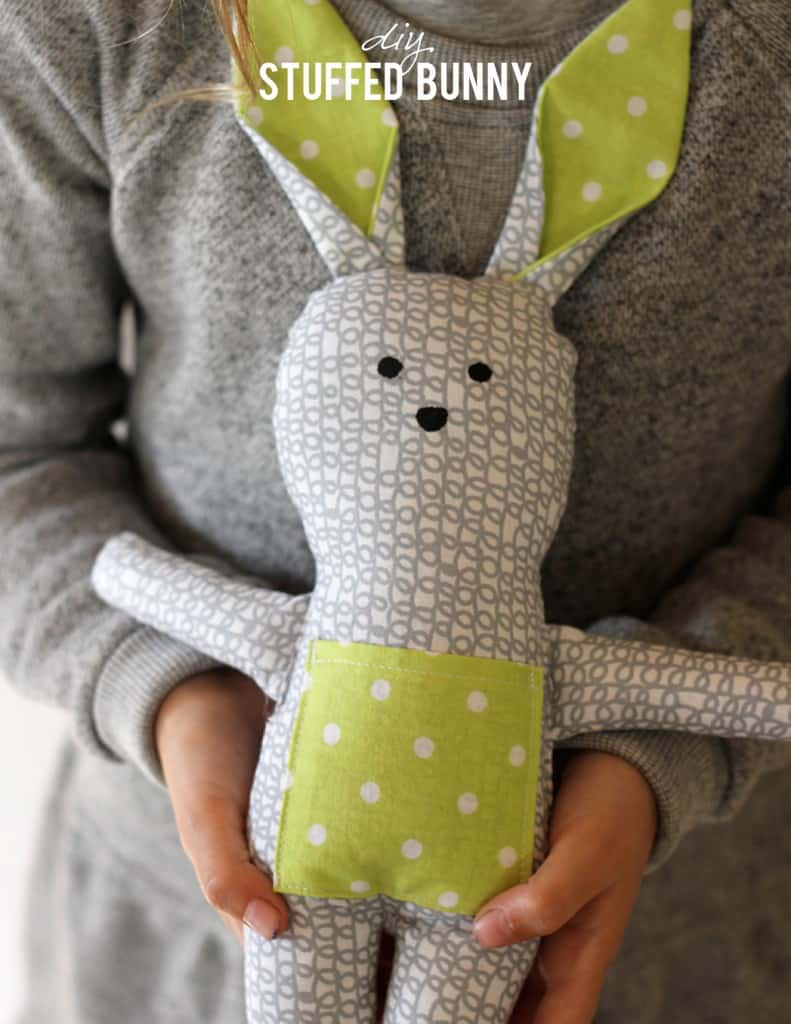 gray and green stuffed bunny