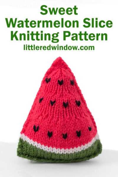 triangular knit watermelon slice with green rind and bright pink watermelon with black seeds from the front on a white background