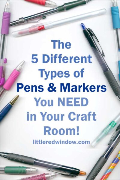 rainbow colored pens arranged randomly in a circle on a white background