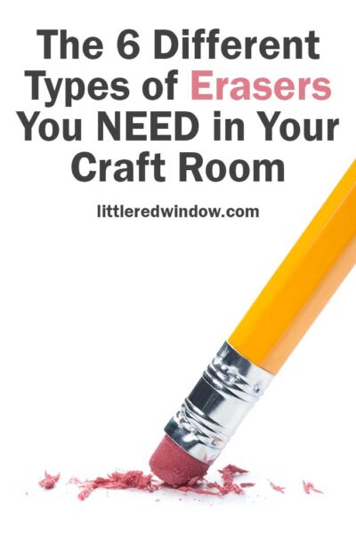 Closeup of the end of a yellow pencil erasing something in front of a white background