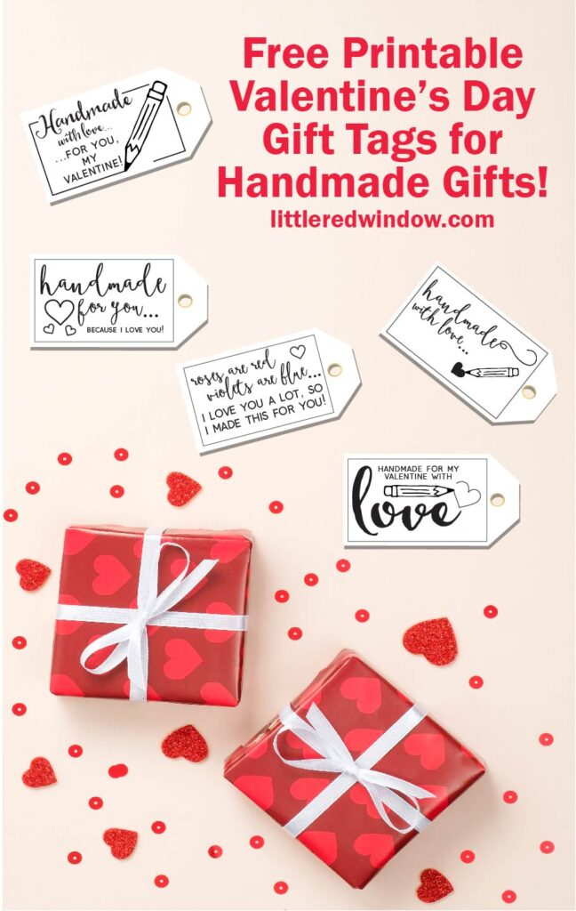 flat lay with light pink background two red presents with heart wrapping paper heart confetti and 5 different valentines day gift tags for handmade gifts
